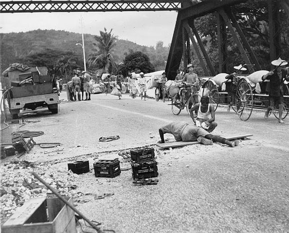 File:Royal Engineers prepare to blow up a bridge in Malaya.jpg