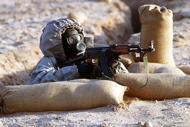 File:Syrian soldier aims an AK-47.JPEG