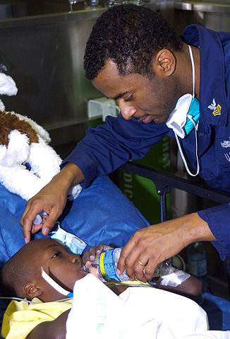 File:Usns comfort patient haiti jan22.jpg