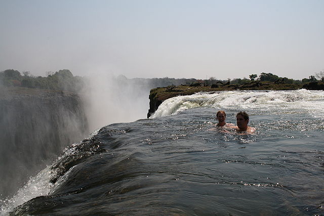 File:Tourists swimming at Victoria Falls.jpg
