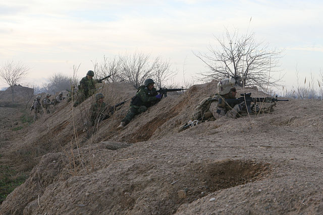 File:1st Battalion 6th Marine Regiment take cover outside Marjah.jpg