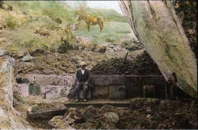 File:Man sitting on Incan ruins in Peru.jpg