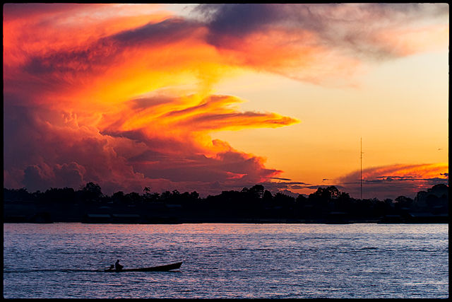 File:Sunset on the Amazon (7613489930).jpg