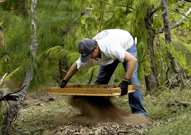 File:Sifting for POW remains, Wake Island.jpg